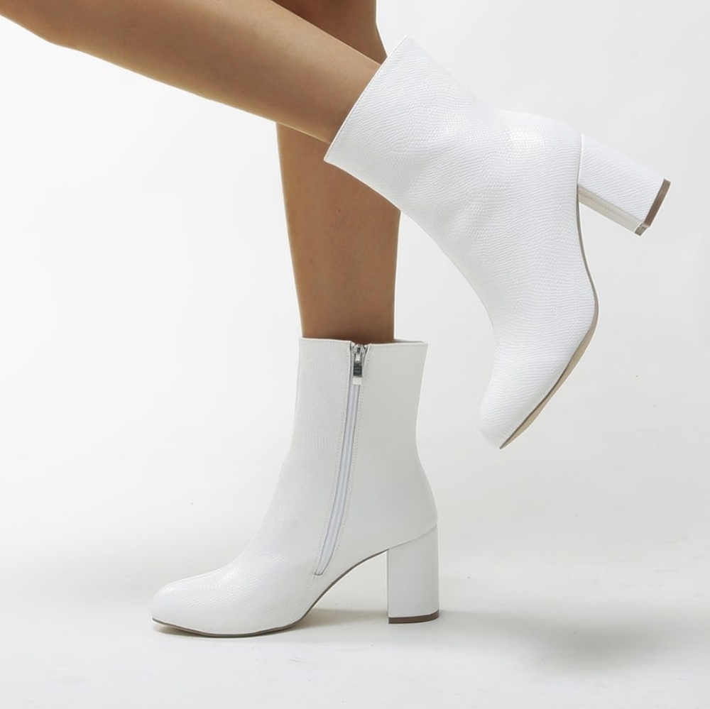 White snakeskin boots